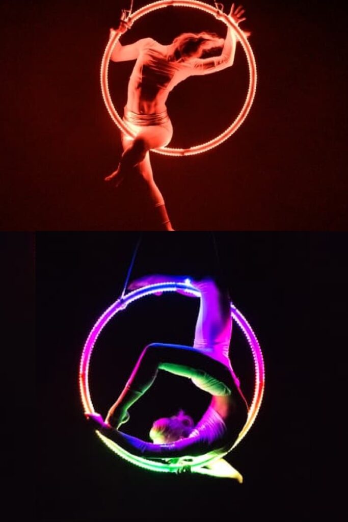 Showact mit Aerial Hoop: Kraftvolle Luftakrobatik im Ring, kombiniert mit Eleganz und Dynamik – Highlight für Gala und Firmenevent